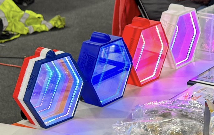 Image of 4 hexagonal infinity mirrors on the awards table